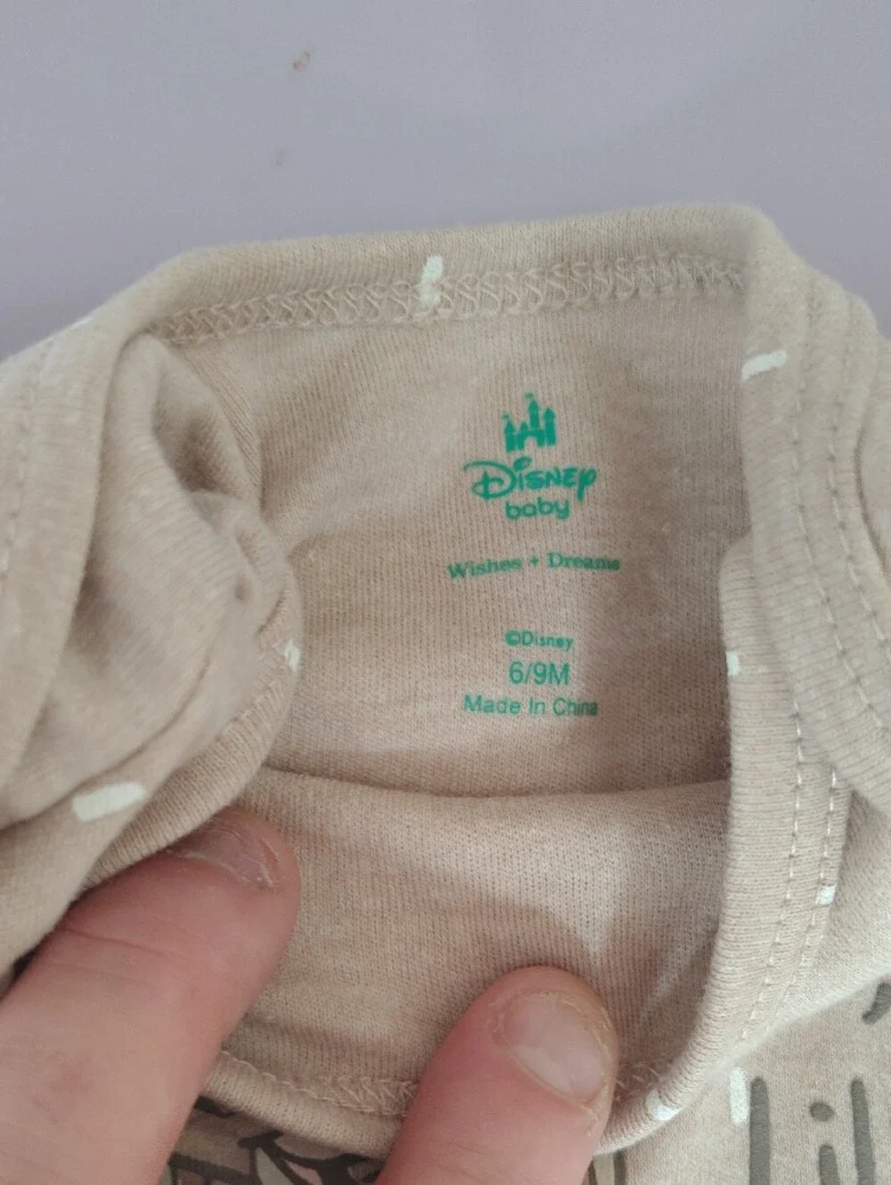 Disney beige bodysuit
